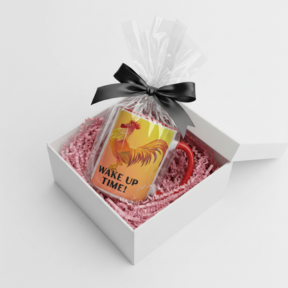 Wake Up Time Mug wrapped in clear cellophane with a black bow in an open white gift box with pink crinkle paper